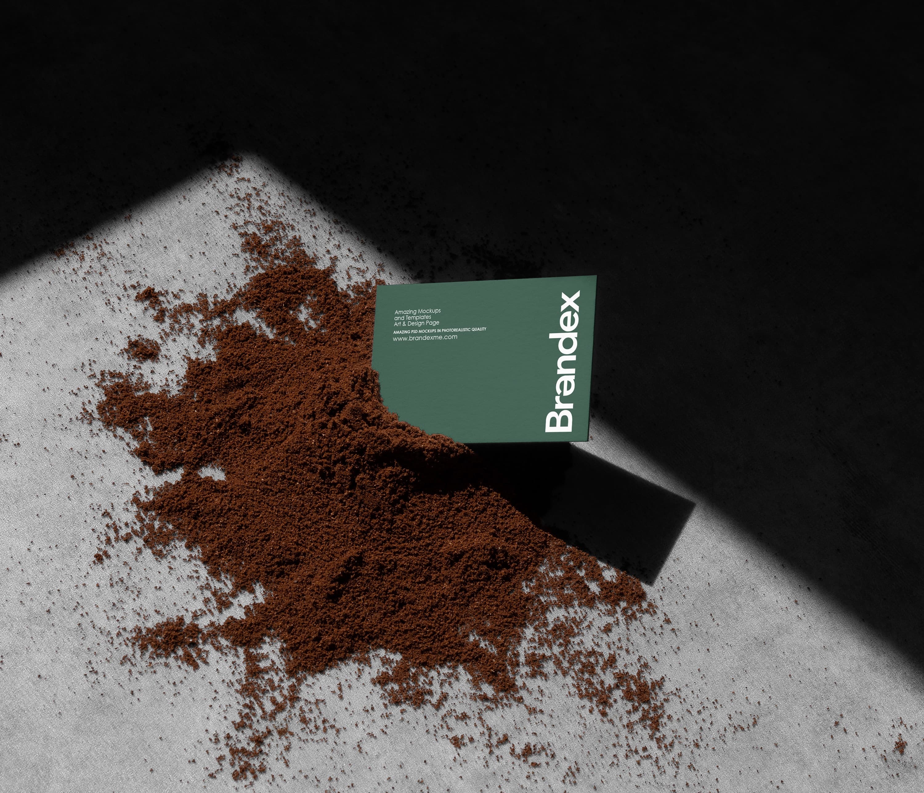 Green business card on coffee grounds mockup