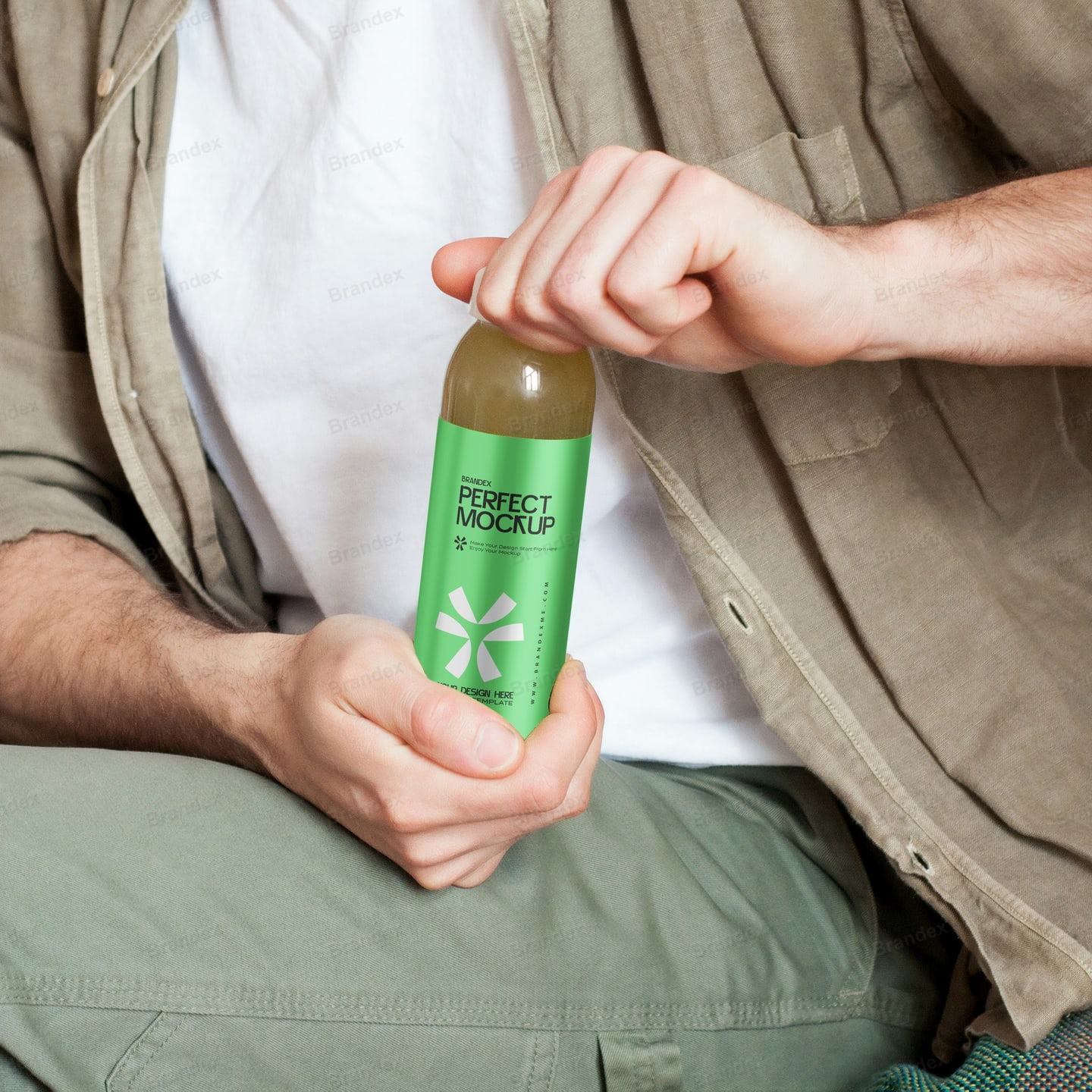 Sleek Green Label Beverage Bottle Mockup Casual Hand Held